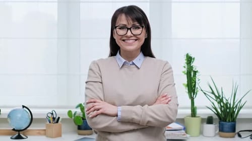 Portrait of Confident Mature Woman in Front of Home Office