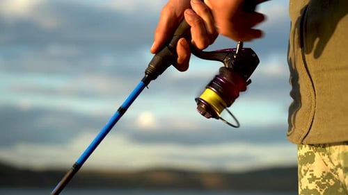 Fishing Rod Reeling Line Outdoors Close Up