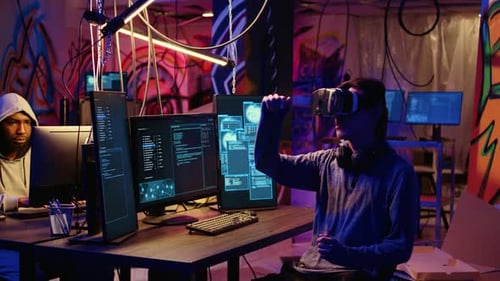 Hacker Using Virtual Reality Goggles