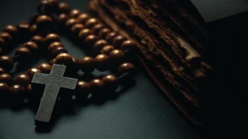 Holy Bible and Wooden Cross on the Desk Spirituality Religion and Hope Concept Symbol of