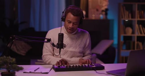 A Musician Creates Beautiful Melodies in a Cozy Studio Inspiring Artistic Expression