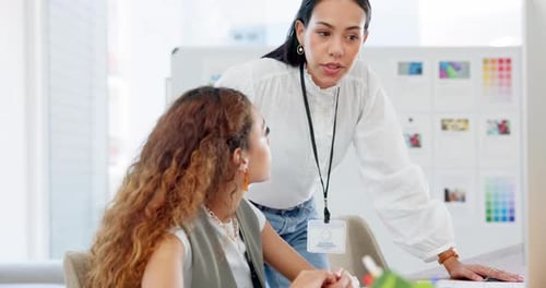 Business women, training and teamwork on computer for marketing advice, website design planning