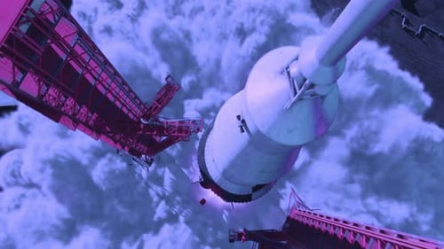 Rocket launches into cloudy sky