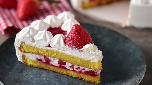 Delicious Strawberry Cake Slice with Cream and Filling