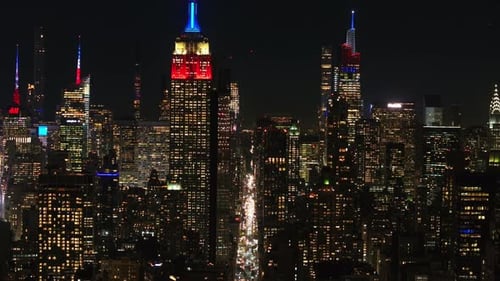 New York City Skyline Sparkles at Night Empire State Building Stands Tall in Midtown Manhattan City