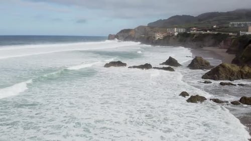 Aerial drone view of the beach of Bakio in the Basque Country in a foggy day