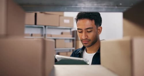 Man, scanner and boxes with tablet at warehouse for inspection, stock and inventory management