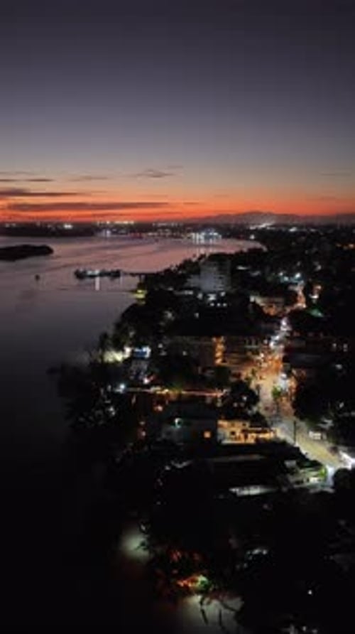 Aerial Night Of Boca Chica Bay And Town, Dominican Republic, Vertical