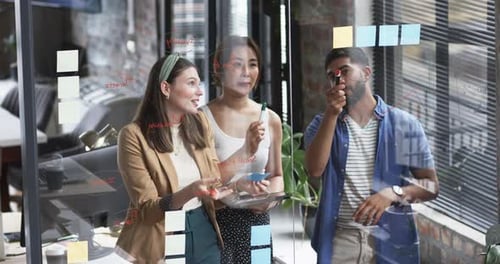 Colleagues Collaborating on Business Strategy in Office