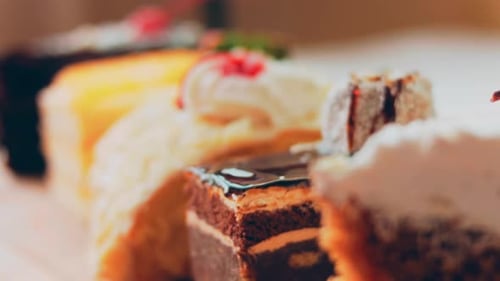 Close Up of Cake Slices on Wooden Surface