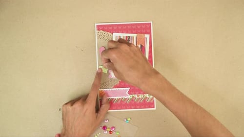 Hands Crafting a Handmade Card