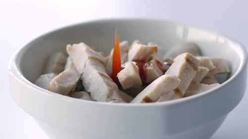 Grilled Chicken Cubes Topped with Red Sauce