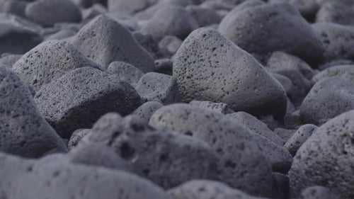 Experience Iceland's rugged beauty with this landscape footage. The dramatic contrast against the su