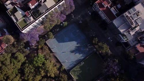 Aerial View of People Playing Basketball on Court