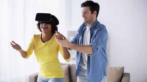 Couple playing with VR Headset in Bright Room