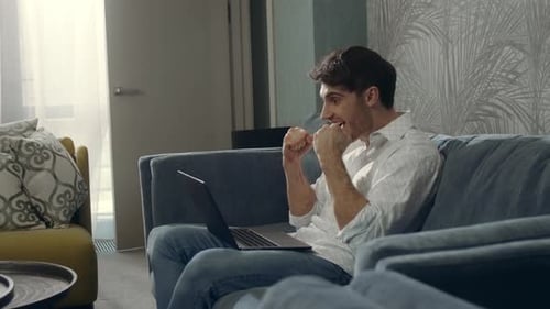 Side View Successful Businessman Getting Great News Letter on Computer Indoors. Excited