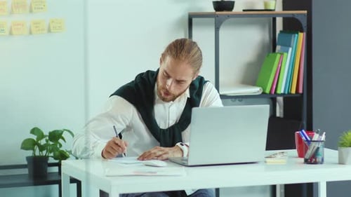 Close Up Young Man Use Laptop Video Call Speaking in Office Business Writing Technology Handsome