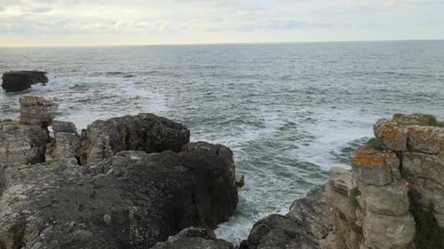 aerial sea waves rocks
