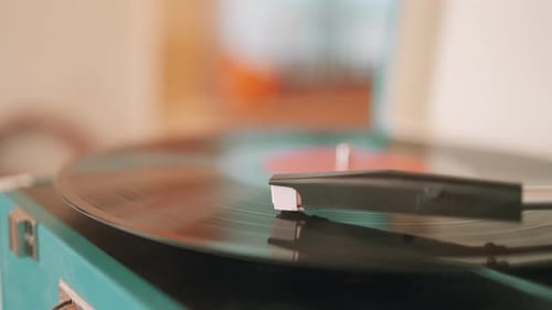 Spinning Vinyl Record on Blue Record Player