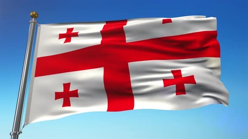 Realistic Waving Flag of Georgia Against Blue Sky