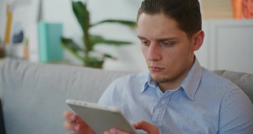Concentrated Man Browsing Internet