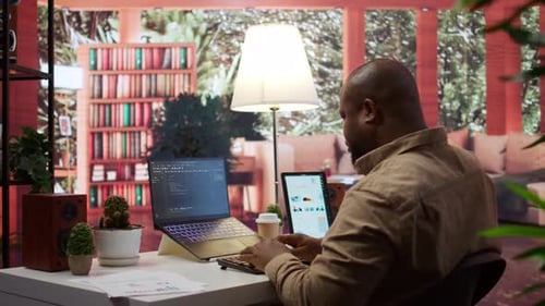 Professional IT Engineer at His Desk Working on AI Coding and Deep Learning