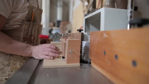 Carpenter Using Table Saw in Workshop 3539 Years