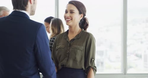 Professionals Shaking Hands at Corporate Meeting