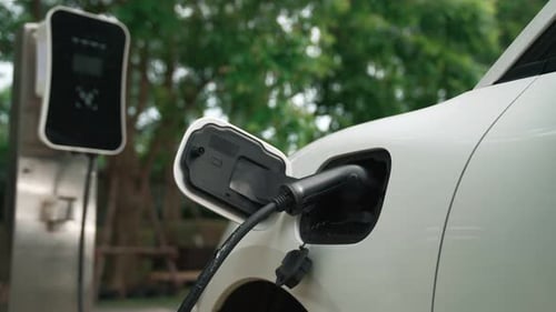 Progressive Concept of Electric Car Parking and Recharging at Charging Station