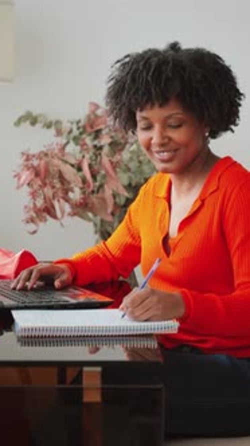 Woman Works From Home Typing on Laptop, Writing