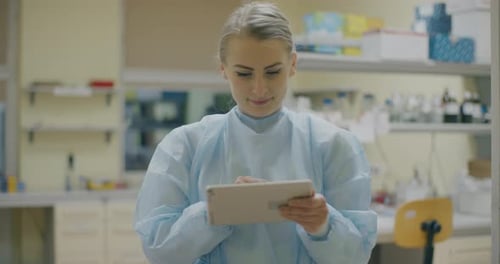 Young Woman Using Tablet in a Lab