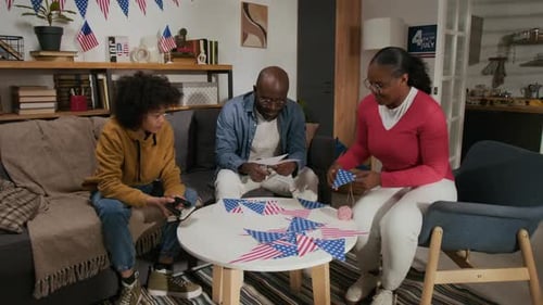 Family Decorating for Fourth of July at Home