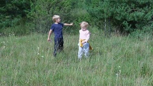 Back View Brother and Sister Holding Hands and Running in Meadow Siblings Two Little Children