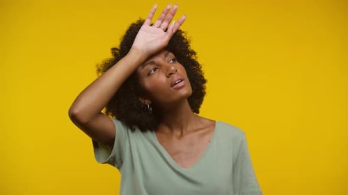 Woman Feeling Hot and Exhausted in Studio