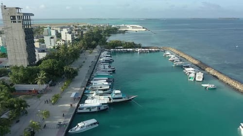 Drone photo of waves. The Maldives on a sunny day