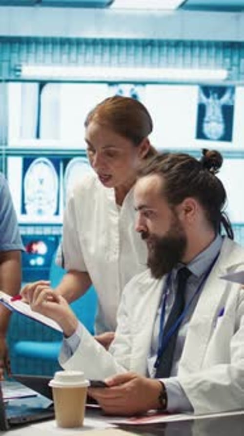 Medical Professionals Reviewing Patient Data in a Modern Hospital
