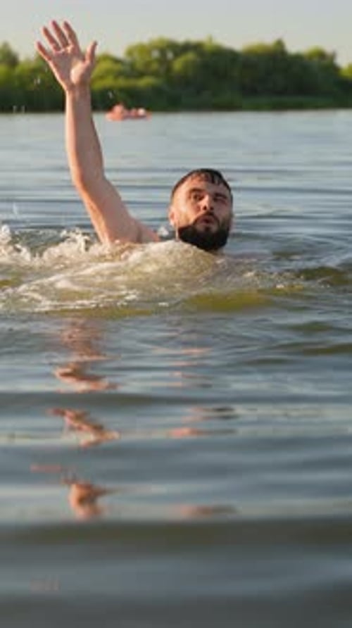 Man Drowning in Lake and Asking for Help