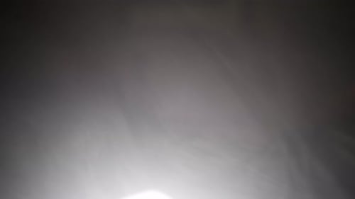 Smoke and fog in front of dark background for halloween or science fiction, sci-fi background.