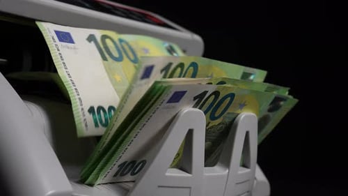 Money Counter Machine Counts Stack of Euro Notes