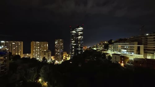 View of the Illuminated Skyscrapers of Monte Carlo at Night Timelapse