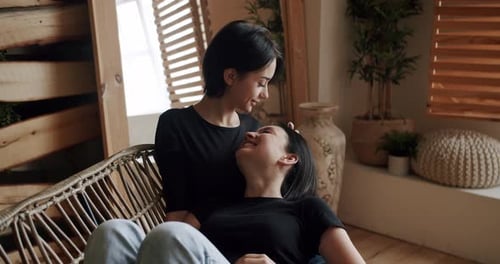 Affectionate Women Couple Loving Moment Indoors