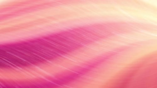 A blurry pink and purple background with a bright light in the center