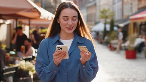 Young Woman Using Credit Bank Card Smartphone While Transferring Money Purchases Online Shopping