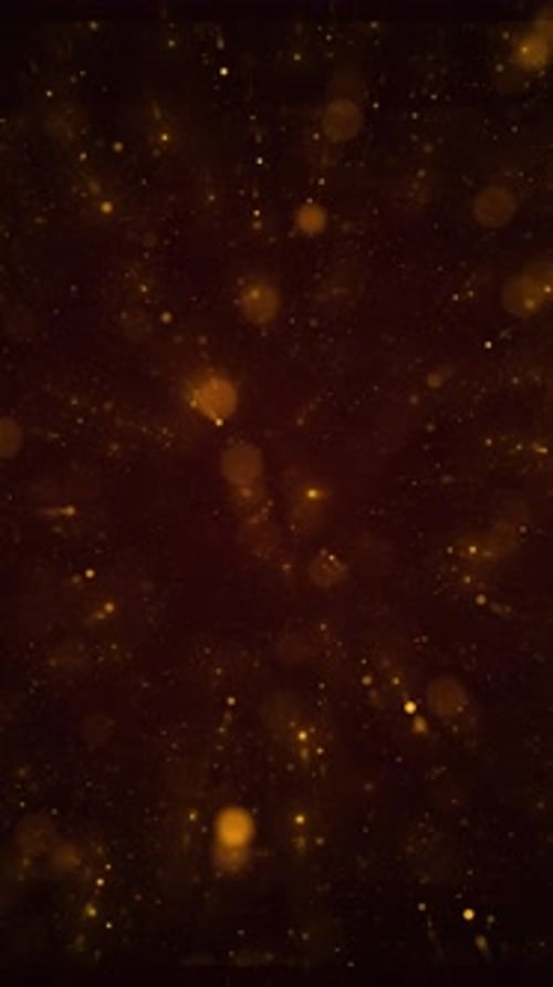 Golden particles dust particles fly in slow motion in the air lingering slowly. Dust Particles Backg