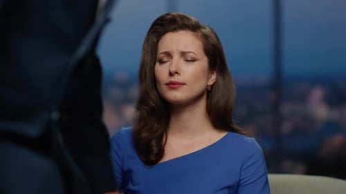 Serious Anchor Television Show Presenting Guest in Channel Tv Studio Close Up