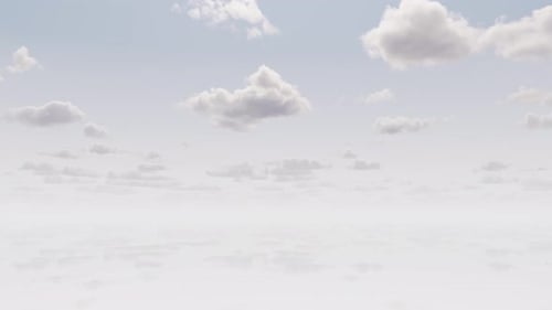 Soft White Clouds Moving Across a Blue Sky Loop