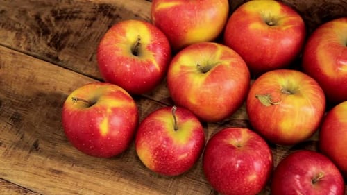 Fresh Red Apples on Rustic Wooden Background