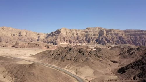 Old Desert road with desert mountain landscape, Aerial view