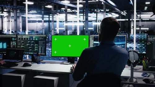 Data Center Engineer Using Machine Learning Algorithms on Green Screen PC