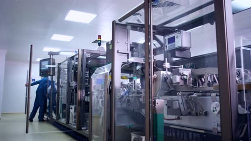 Pharmaceutical Factory Machine. Manufacturing Machine. Operator Control Pharmaceutical Equipment. Ph